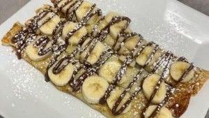 Banana Nutella Crepes · Creamy hazelnut chocolate nutella and fresh sliced bananas stuffed into our crepes