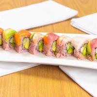 Rainbow · California roll topped w/ salmon, tuna, snapper, avocado & shrimp.