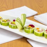 Princess · Tuna salmon, white fish, avocado, and crab wrapped with cucumber.