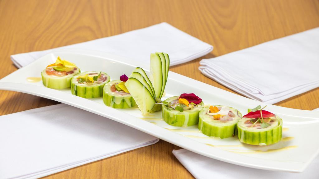 Princess · Tuna salmon, white fish, avocado, and crab wrapped with cucumber.