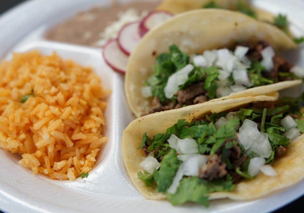 Taco Plate · 3 Tacos with your choice of meat on Corn or Flour Tortilla; Cilantro & Onion! Rice and Beans
