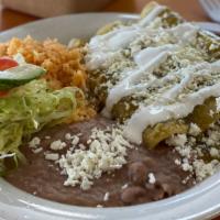 Enchilada Plate · Your choice between: Chicken or Cheese with Green Tomatillo Salsa, topped with Queso Fresco ...