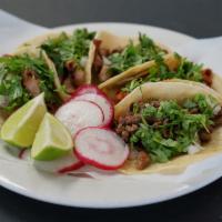 Taco(S) · Corn tortilla with choice of meat, cilantro, and onion.