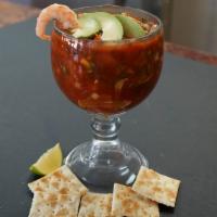Shrimp Cocktail · Homemade cocktail recipe—mixed with Onions, Tomatoes, Cilantro, Topped with Avocado. Cracker...