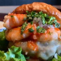 Mar Y Tierra · Cheeseburger, shrimp sautéed in butter with garlic sauce, pico de gallo, avocado covered wit...