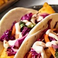 Fish Taco · Red cabbage, pico de gallo, avocado and jalapeño ranch
