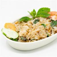 Basil Fried Rice · Stir-fried rice with bell peppers onions sweet basil mushrooms and bamboo shoots.