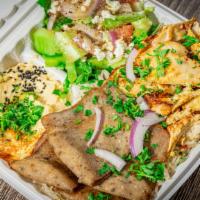 Mixed Shawarma Plate · Rice, salad, baba ganouj, tzatziki sauce.