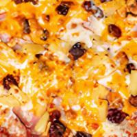Hawaiian · Pineapple chunks, thin sliced Canadian bacon, cranberries, cashews, topped with cheddar and ...