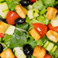 House Salad · Mixed greens, Roma tomatoes, cucumbers, black olives, and croutons