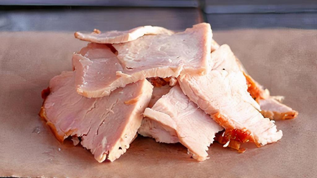 Turkey Breast Plate · Slow-smoked sliced turkey breast, served with 2 sides and a roll