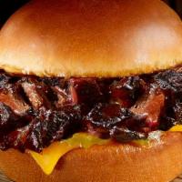 Brisket Burnt Ends Sandwich · Chopped burnt ends of brisket with cheese & pickles, served on at toasted brioche bun.