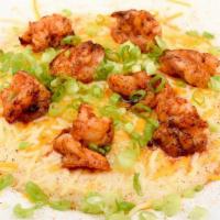 Shrimp & Grits · Shrimp, Bacon, Mushrooms, green onions, cheese, seasoning and grits with butter.