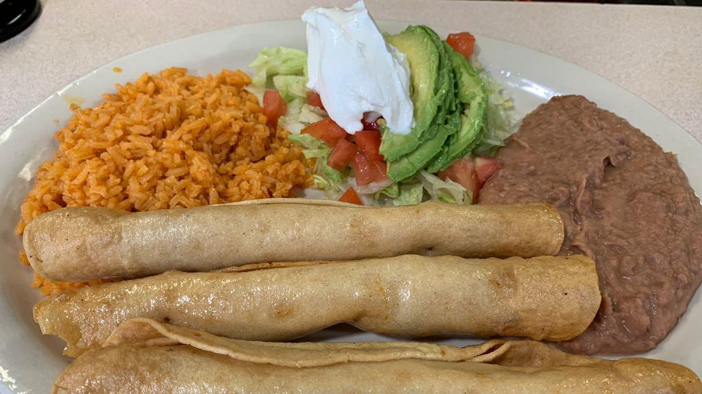 Flautas Plate · 3 chicken flautas, served with rice, refried beans, salad, guacamole and sour cream.  No tortillas.