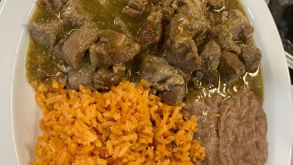 Puerco En Salsa (Green Or Red) · Pork meat cooked with either green or red sauce, served with refried beans, rice and two tortillas.