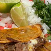 Quesabirrias Plate · Three Birria quesadillas on corn tortilla and Monterrey cheese, served with cilantro, onions...