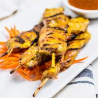 Chicken Satay (4 Pcs.) · Sliced, marinated, skewered and grilled meat-on-stick served with Thai peanut sauce.