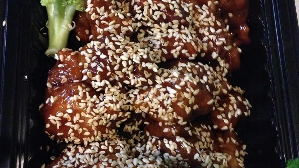 Sesame Chicken · Fried breaded white meat chicken with  sweet sauce with some sesame seed ,and serve with steam rice and egg roll.