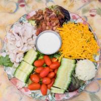 Tea Room Cobb Salad · A bed of spring mix topped with diced
deli turkey, bacon, tomatoes, English
cucumbers, our h...