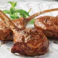 Lamb Chop · topped with red wine reduction sauce