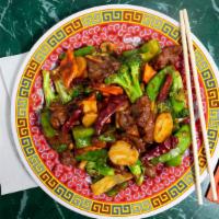 Hunan Beef · Thin sliced beef sautéed with fresh broccoli, bamboo shoots and straw mushrooms in chef`s sp...