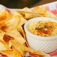 Hoot & Hooty’S Queso · Smoked bacon and roasted pepper queso with chips.