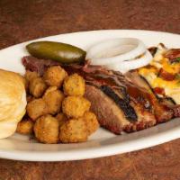 1 Meat · Meats Rubbed, mopped and slow pit-smoked. Served with your choice of two made from scratch s...