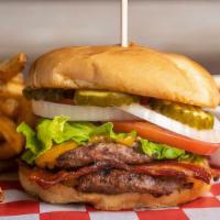 The Daddy Burger · Burger with BBQ sauce, cheddar cheese, bacon, lettuce, tomato, onion & pickles.