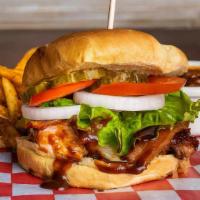 The Yardbird · Sauced up, smoked chicken with jack cheese, bacon, lettuce, tomato, onion & pickle chips.