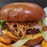 Jalapeno Burger · Beef Burger, topped with jalapenos, lettuce, tomato, onions, mayo, served on a Brioche bun. ...