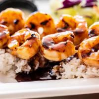 Teriyaki Shrimp Plate · A dish with 12 marinated shrimp, grilled to perfection. Covered in fresh teriyaki sauce and ...