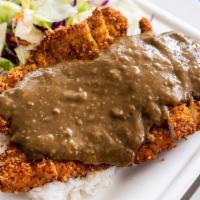 Katsu Curry Pork · Panko breadcrumb coated pork served with a traditional Japanese Curry sauce over the top. Th...