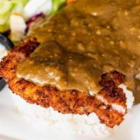 Katsu Curry Chicken · Panko breadcrumb coated chicken served with a traditional Japanese Curry sauce over the top....