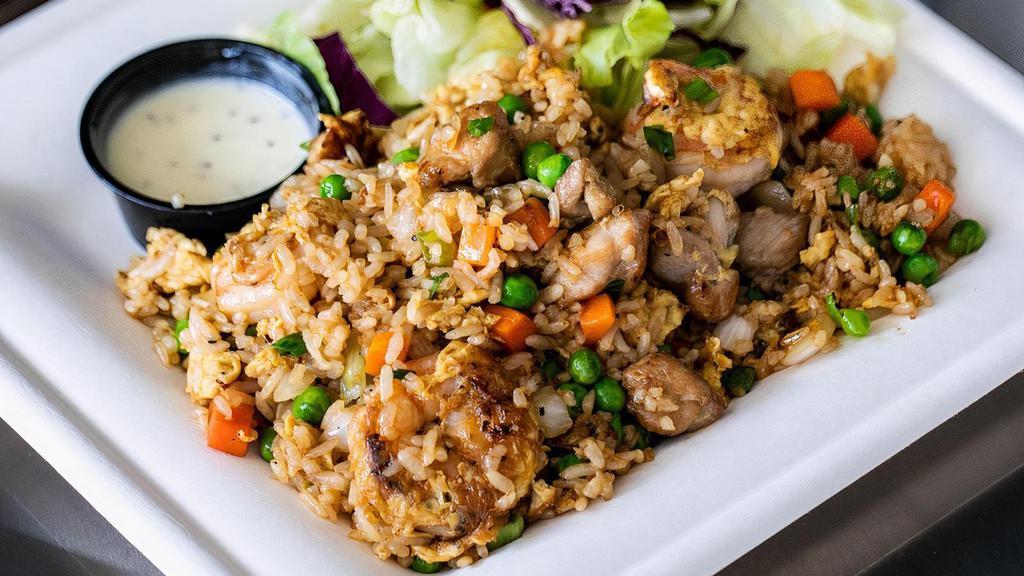Fried Rice Combination Plate · Your choice of two proteins, grilled and served in a special fried rice dish containing flavors of sesame oil, and garlic.