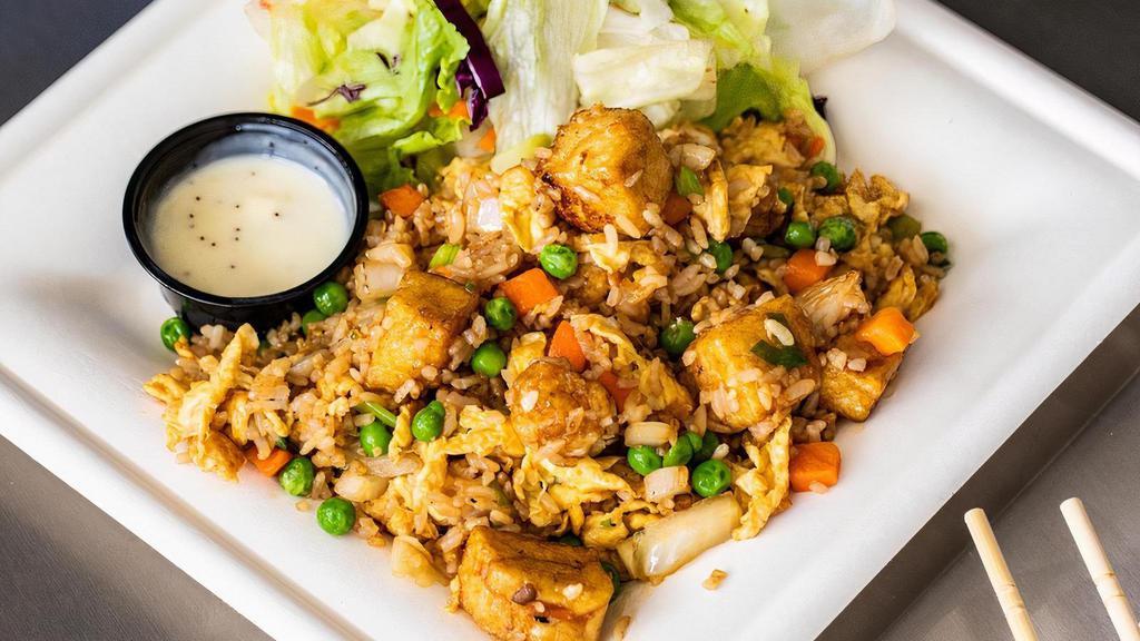 Fried Rice With Tofu Plate · Crispy tofu served in a special fried rice dish containing flavors of sesame oil, and garlic.
