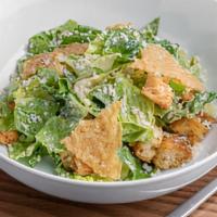 Caesar Salad · Romaine lettuce, herbed croutons, parmesan crisps, caesar dressing.