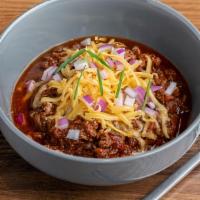 Bowl Of Beer Chili · Beef and beer chili with cheddar cheese and onions.