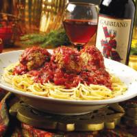 Spaghetti And Meatballs · Spaghetti topped with hand-rolled beef and pork meatballs covered with fresh tomato sauce.  ...
