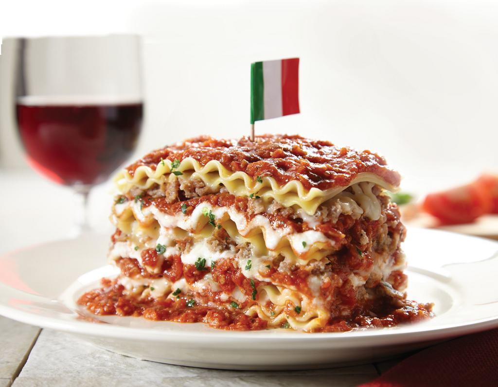 Our Incredible 15-Layer Lasagne · Signature dish. Our all-time guest favorite! layer after layer of lasagne noodles, meat sauce, Italian pork sausage, ground beef and romano, ricotta and mozzarella cheeses. Made by hand daily and topped with more homemade meat sauce.