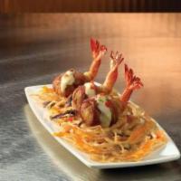 Shrimp Enbrochette · Crab cake stuffiing, pepperjack cheese, jalapenos, bacon wrapped.