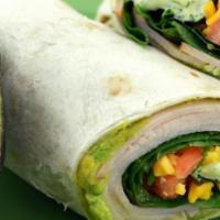 Turkey Avocado Wrap · smoked turkey, shredded romaine hearts, guac, tomatoes, cheddar cheese, and ranch dressing