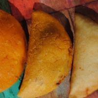 Empanadas · 3 three cornflour wraps stuffed with a delicious filling of your choice.