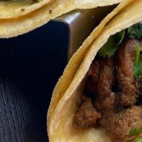 Trio Tacos · Three fresh flour or corn tortilla with cilantro onion, and your choice of meat.