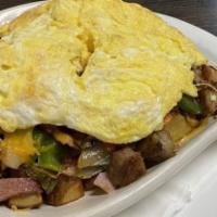 Meat Lover Skillet · 3 eggs any style, ham, sausage, bacon, onions, bell peppers, mushrooms and cheddar cheese on...