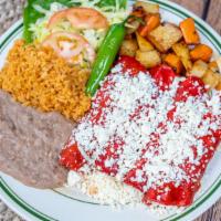 Enchiladas  · 4 beef or queso fresco enchiladas served with potatoes, carrots, lettuce and tomato, refried...
