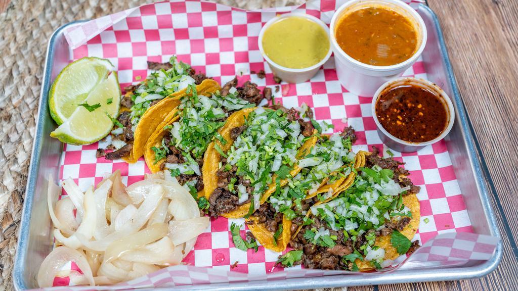 Mini Tacos · 5 mini tacos Available in Corn or flour. Meat options are beef,trompo.barbacoa, or chicken, Served with onions, grilled onions, cilantro and charro beans.