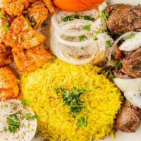 Mixed Grill Plate · Choice of two skewers. Comes with rice, grilled vegetables, fresh pita bread, and your choic...