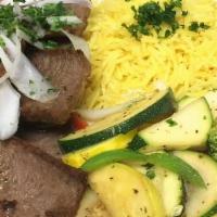Gyro Plate · Seasoned lamb and beef gyro meat roasted on Sababa's rotating spit grill. Served with tzatzi...