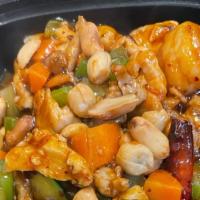 Kung Pao · Spicy kung pao sauce, carrot, celery, zucchinis, water chestnut, peanut with rice.