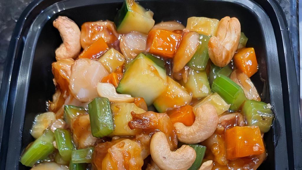 Cashew · House brown sauce, diced bamboo, carrots, water chestnut, zucchinis, celery, cashew nuts with rice.